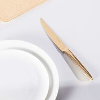 سكين الستيك لام دو كريستوفل باللون الذهبي