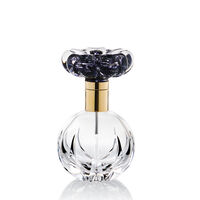 Clear Perfume Bottle With Black Flower And Gold Metal, small