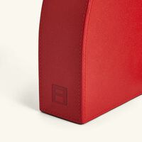 آسولين مسند كتب أحمر تكعيبي التصميم   لإسناد الكتب من اليسار