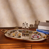 فيلاري فنجان الشاي بيكوك مع صحنه باللون الذهبي